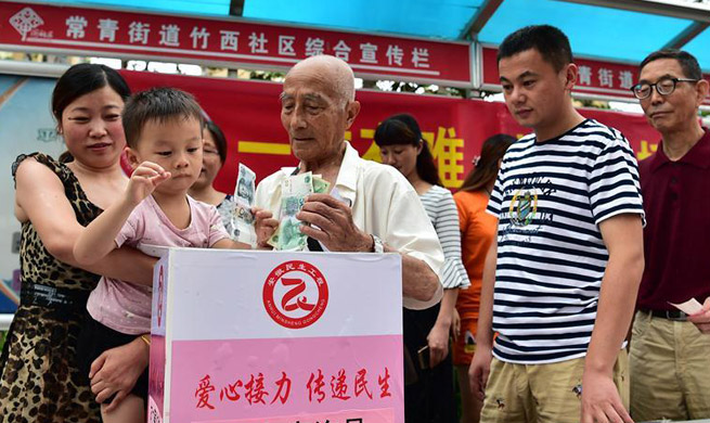 Local community organizes donation event to aid Jiuzhaigou in Hefei