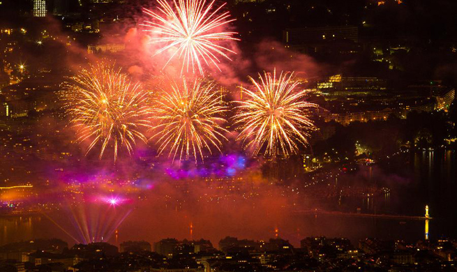 Fireworks illuminate sky over Leman Lake during Geneva Festival in Switzerland