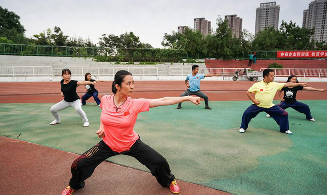 Wushu master practises boxing of Huo with students in Tianjin