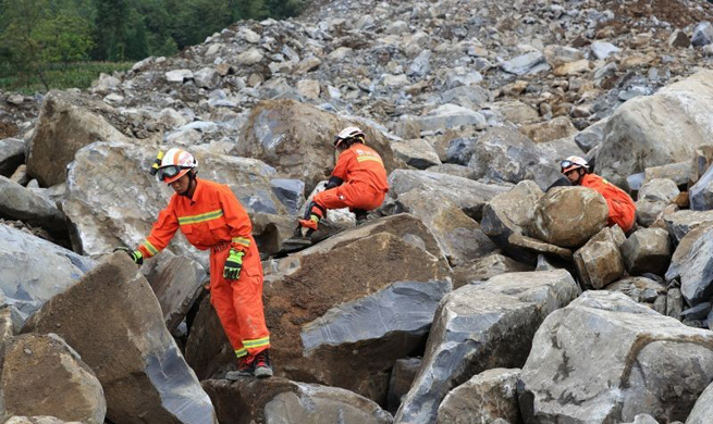 Two dead, 25 missing after landslide in southwest China