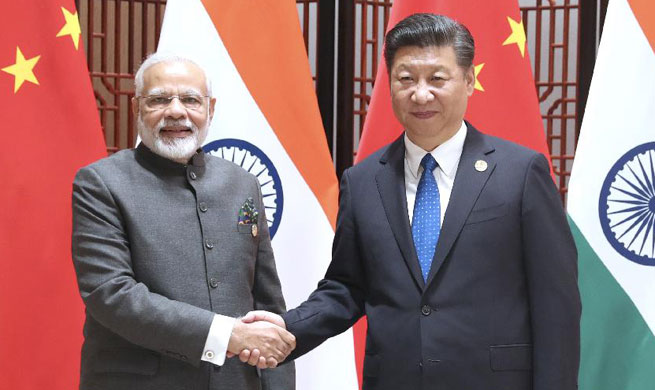 Xi, Modi stress stable, cooperative China-India ties