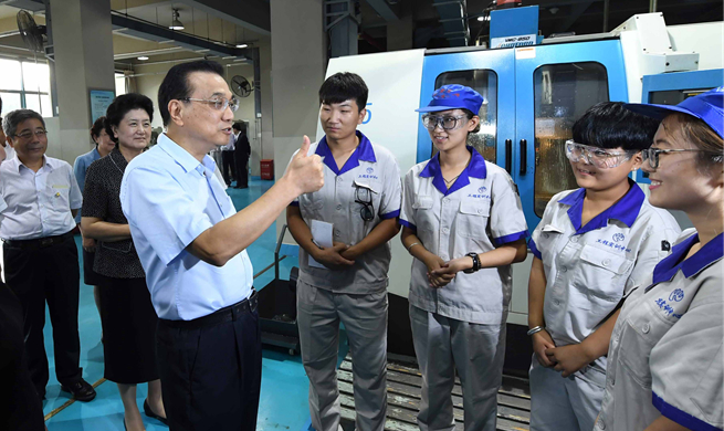 Premier Li stresses vocational education to boost "Made in China" brand
