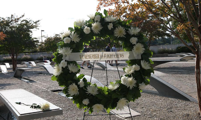 People visit Pentagon Memorial to honor 9/11 attacks victims