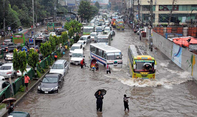 Flood wreaks havoc in Dhaka, Bangladesh