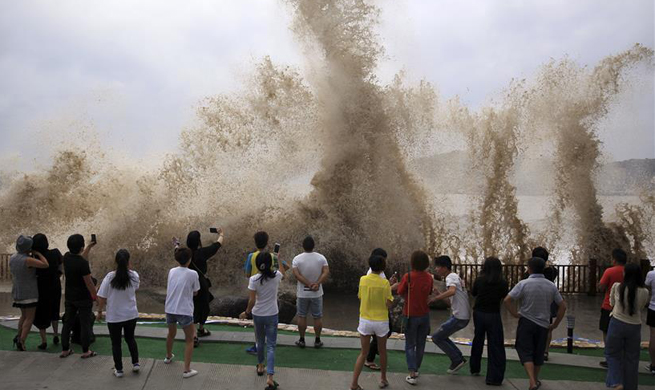 Super typhoon Talim brings gale and heavy rainfall, causing billows in E China