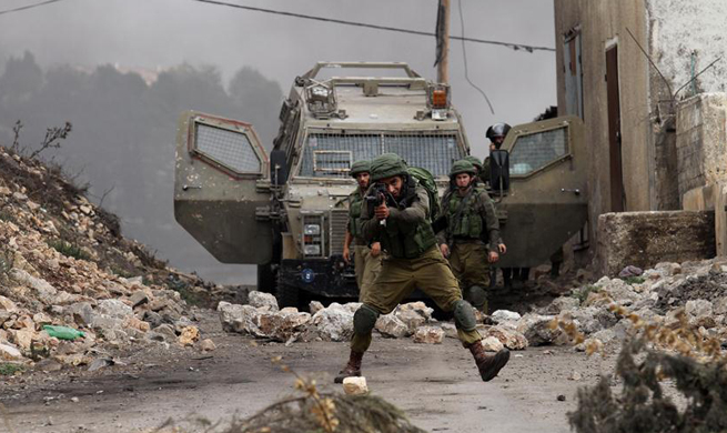 Israeli soldiers clash with Palestinian protesters in Nablus