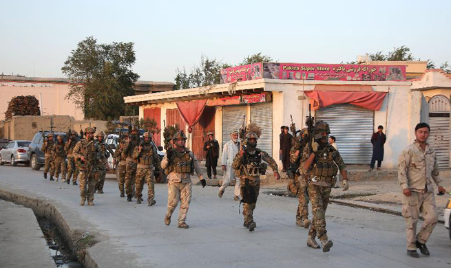 Taliban attacks Kabul during NATO chief, U.S. defense secretary visits, killing 4