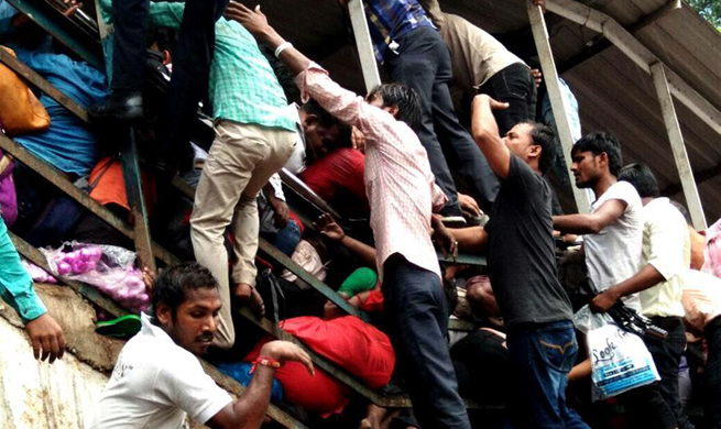 Stampede at railway footbridge in India's Mumbai kills 22