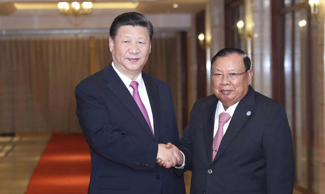 Xi meets Bounnhang again on historic, fruitful visit to Laos