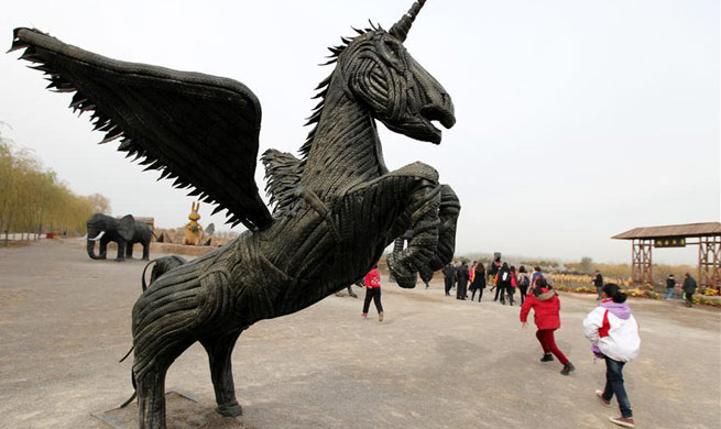 Sculptures made with waste tyres attract crowds in E China