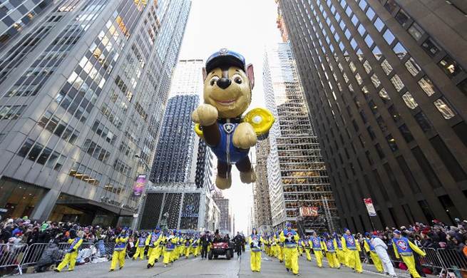 Feature: NYC's Thanksgiving Parade moves smoothly with giant balloons, heavy security