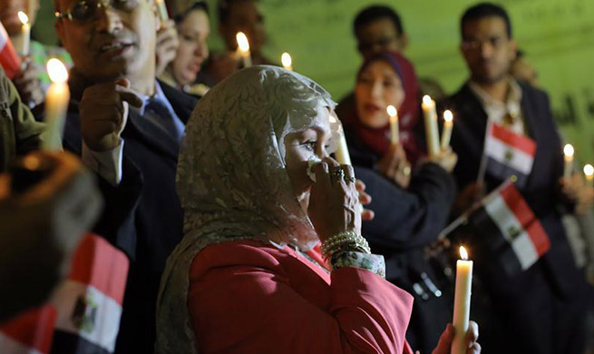 People attend memorial to mourn victims of North Sinai mosque attack