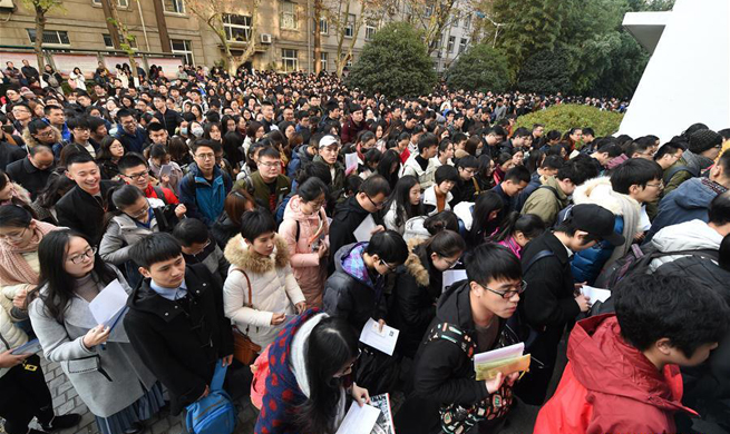 Over 1.1 mln people sit China's civil servant exam