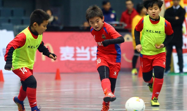 Children take part in football carnival in Tianjin