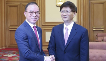 China legal chief meets HK SAR immigration director in Beijing
