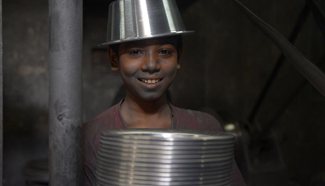 Bangladeshi children work at pot factory to earn money for family
