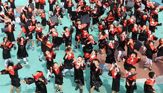 Children celebrate finishing Kindergarten education in Tianjin