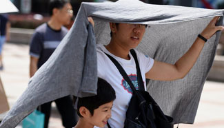 Highest temprature of Beijing hits 35 degree Celsius