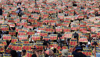 Residents of Japanese island of Okinawa call for US forces to leave