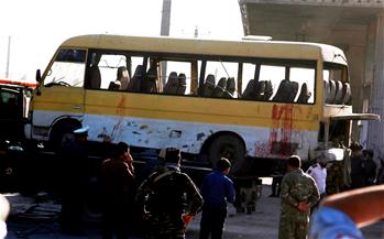 Suicide bomber hits running bus in Afghan capital, killing 14