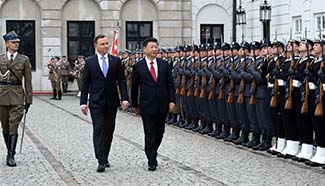 Chinese president attends welcoming ceremony held by Polish counterpart