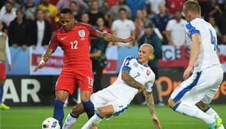 England qualify second after 0-0 tie with Slovakia in Group B