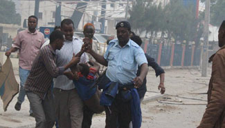 Twin car bomb explosions rock hotel in Mogadishu, Somalia