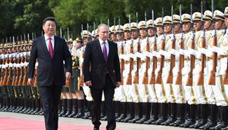 China, Russia vow to deepen partnership