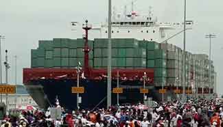 Expanded Panama Canal opens with Chinese ship making first passage