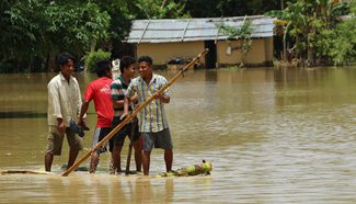 Heavy rainfall floods NE state of Assam in India