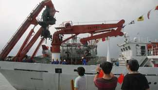 China's manned deep-sea submersible returns to home port of Qingdao