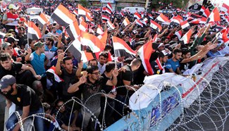 Iraqi people rally in Baghdad to protest corruption, sectarianism