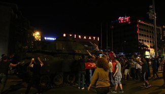 Turkish military statement says "seized power;" president urges people to protect democracy