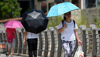 S. China's Guangxi issues blue alert for heat