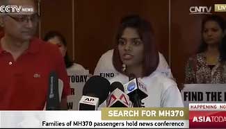 Families of MH370 passengers hold news conference