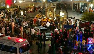 Car crashes into central Bangkok 's Erawan Shrine, injuring 6