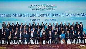 Officials take photos for G20 finance ministers and central bank governors meeting