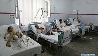 Injured men in hospital for treatment after suicide attack in Kabul