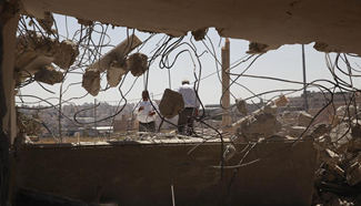 Israel demolishes dozen Palestinian homes in Qalandia