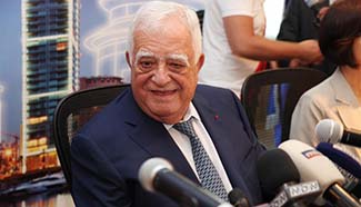 Lebanon's former official hails "Beirut to Beijing" event