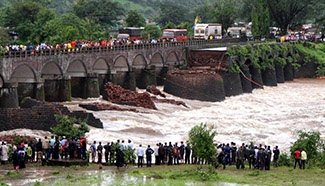 2 dead, 22 missing as bridge collapses in western India