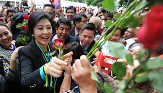 Ex-Thai premier Yingluck appears in court over rice subsidy scheme