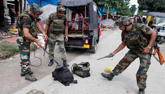 Militants kill 14 in market attack in northeast India