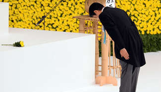 Japan marks anniversary of unconditional surrender in WWII, Abe fails to mention "reflection"