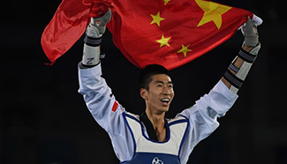 Zhao Shuai captures China's first title in men's taekwondo