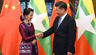 Chinese president meets Suu Kyi in Beijing