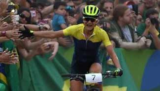 Jenny Rissveds wins gold of women's cross-country race of Cycling Mountain Bike