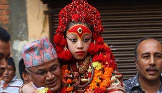 Nepalese Living Goddess Kumari visits Buddhist shrines