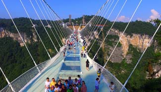 World's highest glass bridge opens in China's Hunan