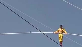 Chinese tightrope artist sets new record for longest high-wire walk